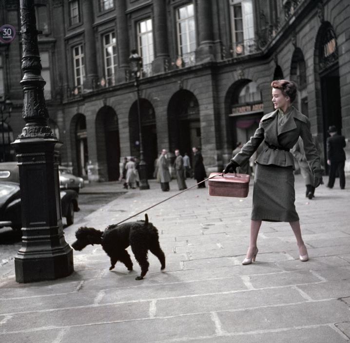FRANCE. Paris. Vendome Square (Place Vendôme). A Dior model, wearing a "New Look" long skirt. 1948 ©Robert Capa/International Center of Photography/Magnum